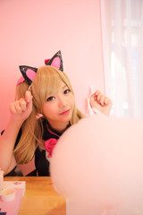 Obraz na płótnie Canvas Japan anime cosplay , portrait of girl cosplay in pink room background
