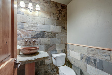 Absolutly stunning bathroom interior deisgn in a luxury rustic cabin style American home with stone...