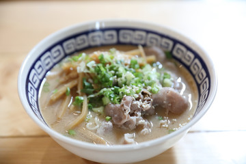 Ramen Japanese noodle soup food with noodle and pork on wooden table