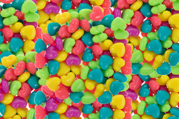 Fototapeta na wymiar multi colored plastic beads background