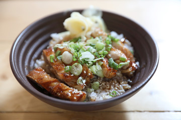 japanese food , Chicken teriyoki with rice on wood background