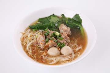 Local Thai food , Noodle with meat ball and pork isolated in white background