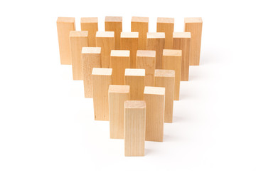 Domino effect, row of wood domino on white background