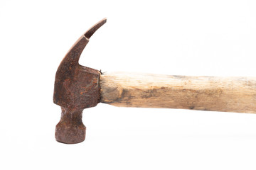 old rusty and dirty wooden handle hammer isolated on white background.