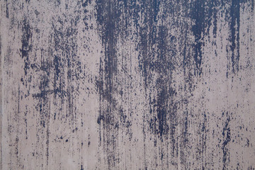 Texture of Old grunge concrete wall backgrounds. Liquid dark paint runs down the concrete wall....