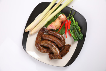 Local Northern Thai food , Northern Thai spicy sausage street food isolated in white background
