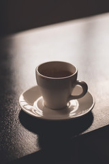 cup of coffee on black background espresso
