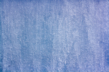 Fototapeta na wymiar Background texture of melting ice. Bubbles and smudges. Horizontal.