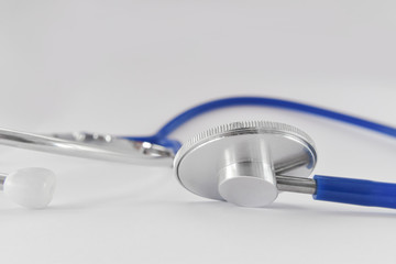 Close-up of blue stethoscope medical on white background. Idea for doctor diagnostic coronavirus...