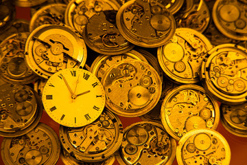 Old clockworks are on the table.