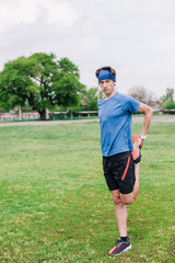 Athlete does warm-up before running at stadium