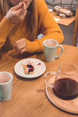 young woman having breakfast