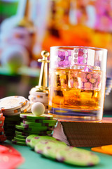 cocktail glass on the casino gambling table