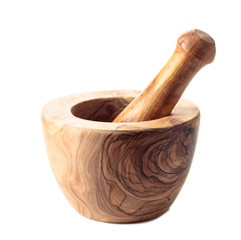 Wooden mortar and pestle isolated on a white background.