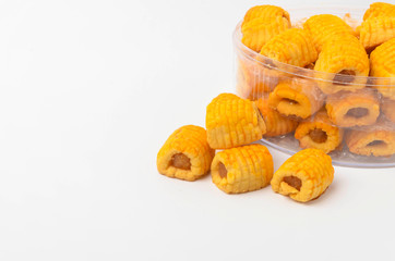 Pineapple roll tart cookies known as Tat Nenas isolated on white background. Modern cookies for Hari Raya Aidilfitri (Eid UI-Fitr) celebration. Pineapple tart isolated.