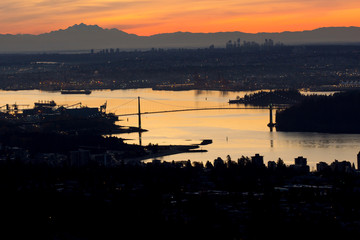 Romantic morning´s sunrise above Vancouver BC with the Lions Gate Bridge in the background.
