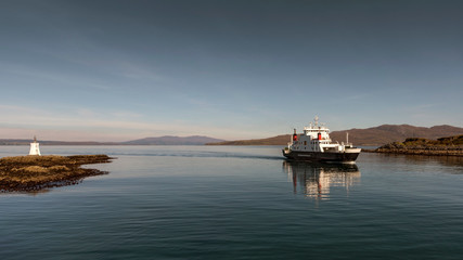 Ferry arrives slowly in to Mallaig harbour from Skye