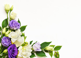 Corner flowers arrangement on white background