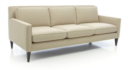 Classic formal sofa for three seats, isolated.Three seats cozy color fabric sofa isolated on white.
