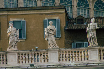 View of marble statues located at the St Peter's Basilica square in the Vatican City
