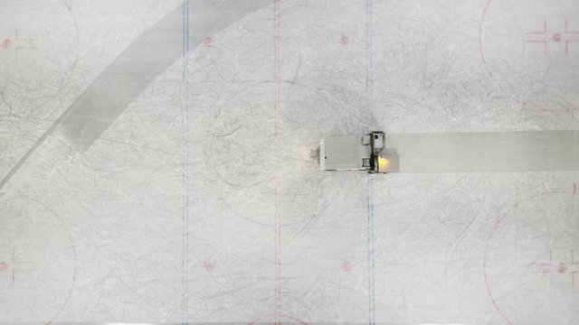Aerial view of the ice resurfacer to clean and smooth the surface of a sheet of the ice rink