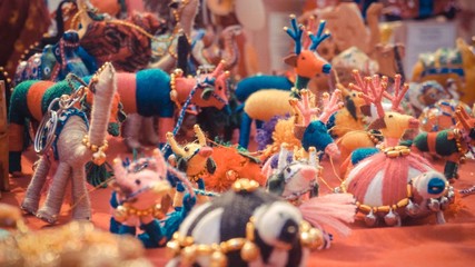 Organised colorful animal dolls on the table