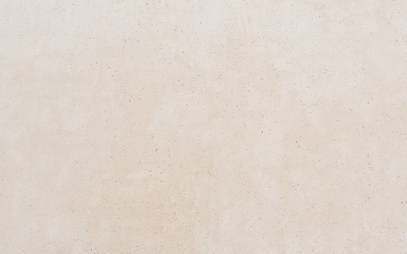 Clean concrete wall texture, beige background