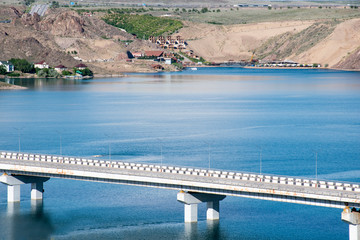 Fototapeta na wymiar Bridge over the sea, transport bridge located on the sea