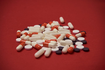 pills on a red background