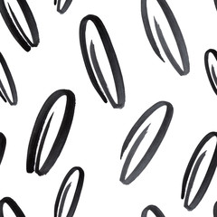 Seamless black and white background with oval brush strokes. Ornament with black spirals on a white background. Pattern with watercolor brush strokes.