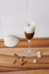 Coffee in champagne glass with coffee bean on top
