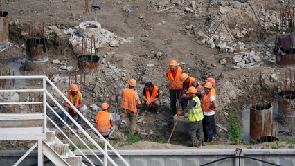 Workers - zero-cycle construction of the foundation of an entertainment center