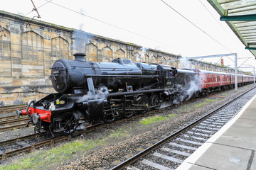 Fototapeta na wymiar LMS Stanier Class 8F 8151 (British Railways No. 48151) is a preserved British steam locomotive or steam engine