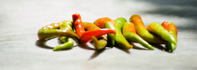 Close-up of fresh and hot chili peppers isolated on a white background
