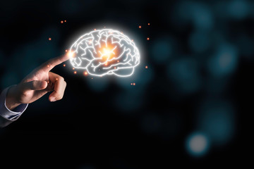 Businessman holding the blue virtual brain. Creative new business idea concept.