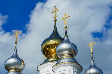 domes of an Orthodox church of gold and silver metal