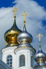 domes of an Orthodox church of gold and silver metal