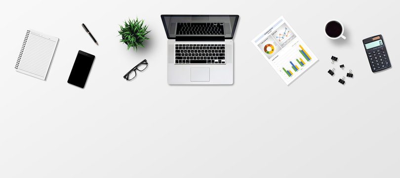 Top view office desk and supplies, with copy space. Creative flat lay photo of workspace desk/Panoramic banner gray background