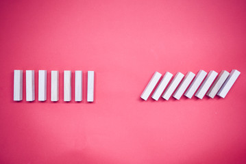 Stop wooden domino business crisis effect or risk protection concept