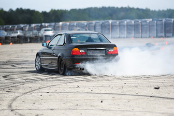 Sport car during drifting. Sport car during drifting.