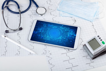 Close-up view of a tablet pc with abbreviation, medical concept