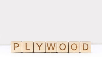 The inscription of the wooden letters cut by laser 