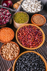 Fresh organic natural beans on wooden rustic background