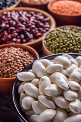 Fresh organic natural beans on wooden rustic background