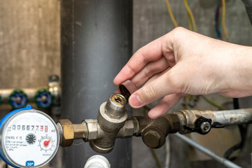 plumbing cabinet. turn off hot or cold water. Removing repair of water pressure sensor