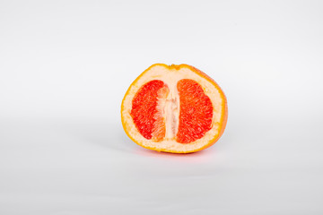 Fototapeta na wymiar Half of grapefruit on a white background