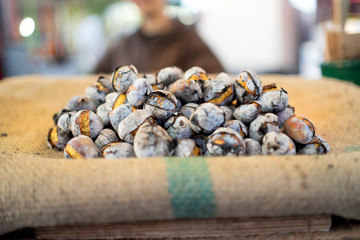 Tasty roasted chestnuts sold on the stall in Portugal