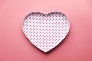 open empty gift box on pink background 