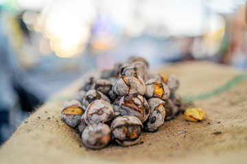 Tasty roasted chestnuts sold on the stall in Portugal