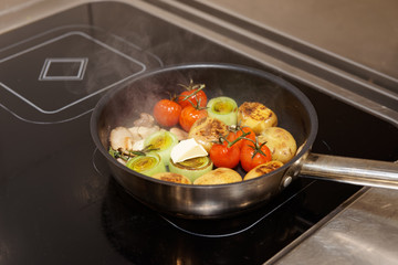Frying vegetables in pan